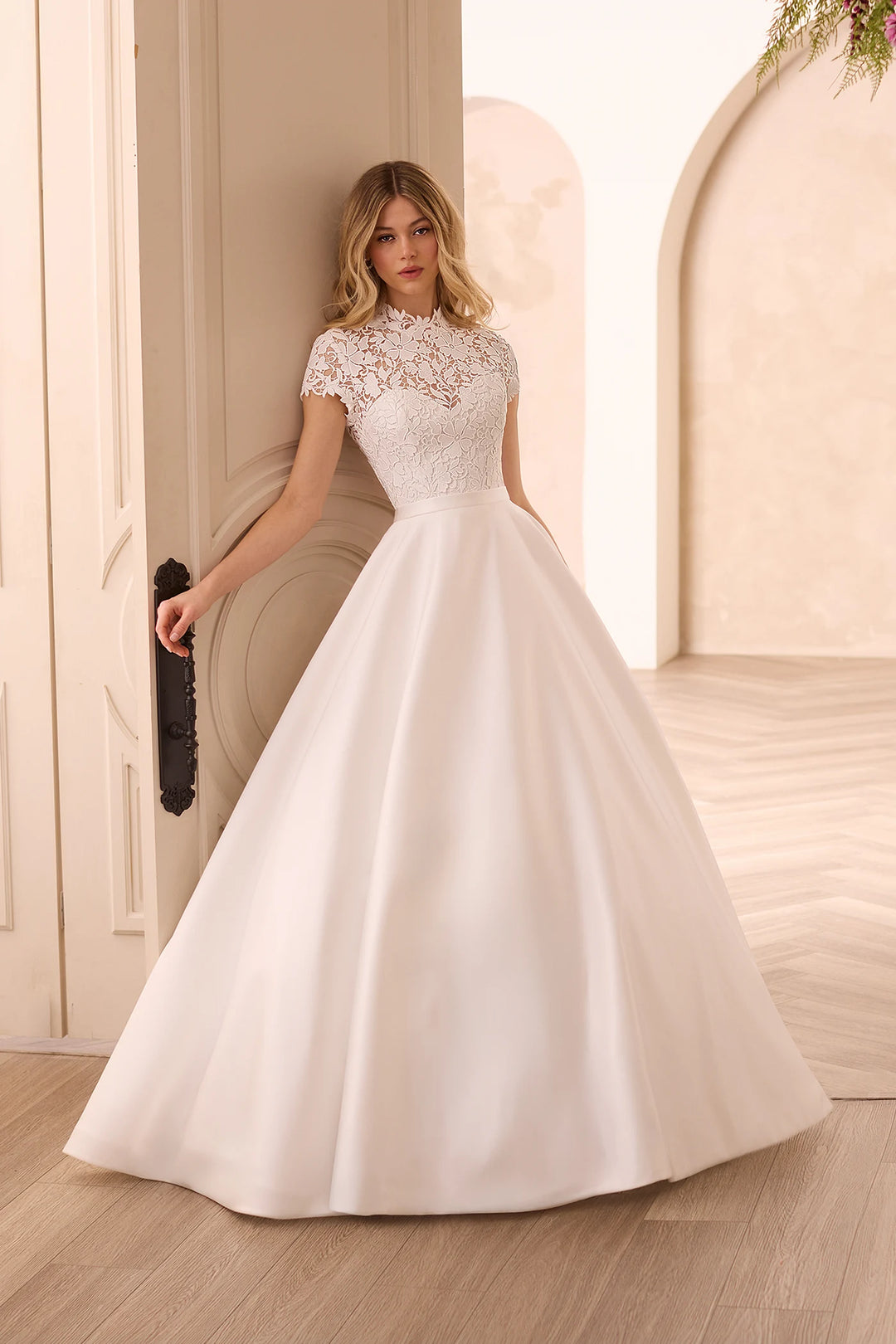 Mikaella Bridal Gown_M2608 Aline Mikado wedding dress with front covered by lace high neck and cap sleeves and keyhole back and buttons front available at toronto bridal shop camellia wedding gown