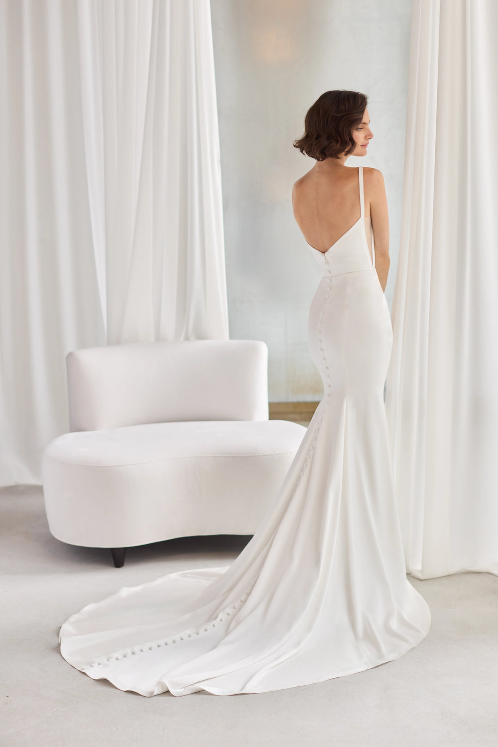 Paloma Blanca P5213 fit and flare wedding dress with draped scoop neckline and sheer side panels - back - Camellia Wedding Gown Toronto