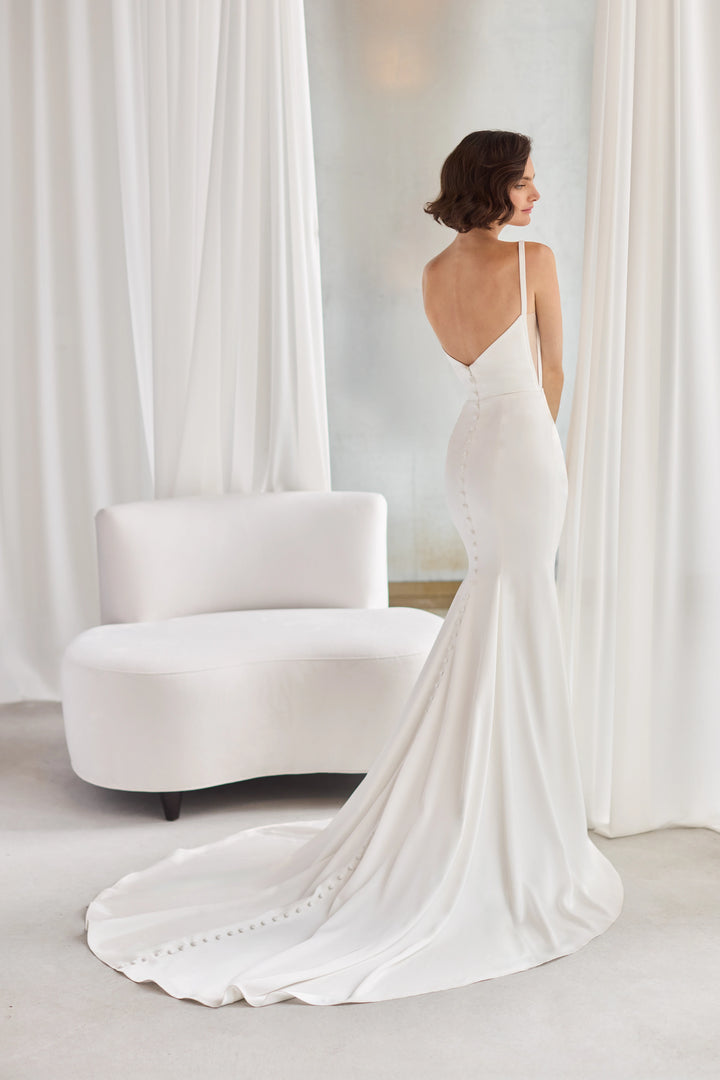 Paloma Blanca P5213 fit and flare wedding dress with draped scoop neckline and sheer side panels - back - Camellia Wedding Gown Toronto