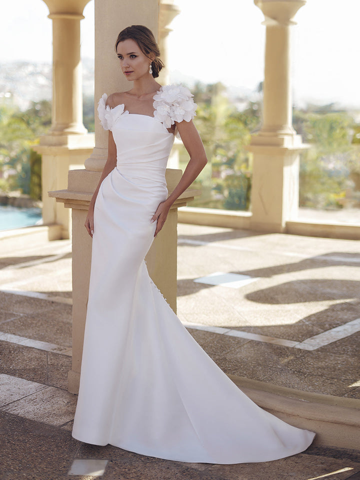 Blue by Enzoani Stella fitted wedding dress with overskirt side view