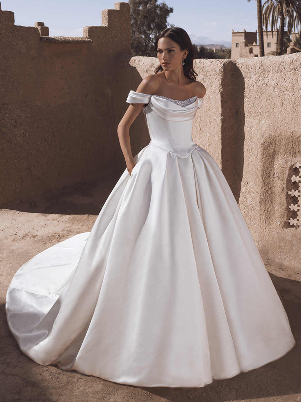 Blue By Enzoani Temina sample sale ballgown wedding dress with off the shoulder straps and structured bodice front view