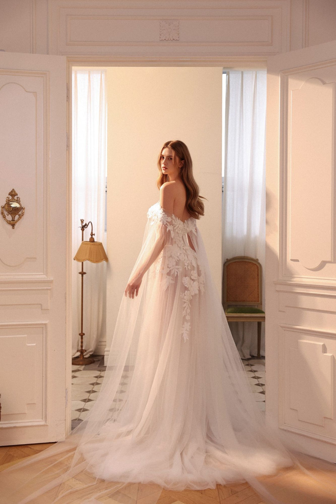 Choie Iridelle sample sale aline wedding dress with floral appliqués back view