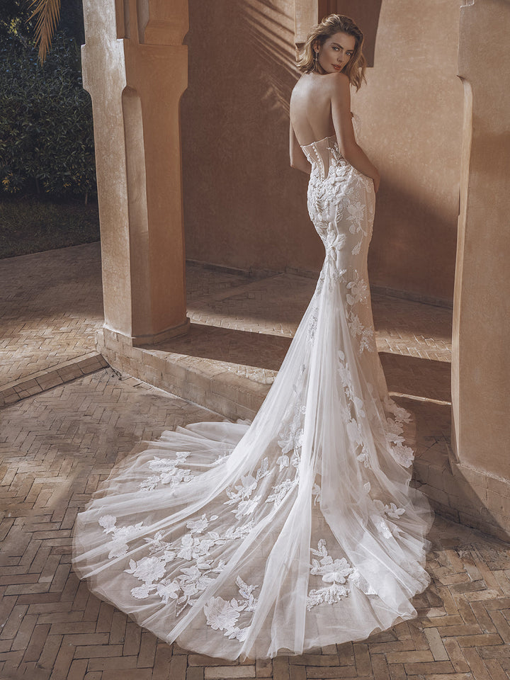 Enzoani Ursa sample sale fitted strapless wedding dress with sparkly floral appliqué back view