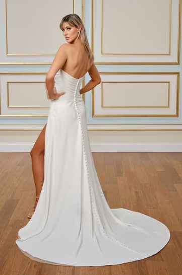 Magnolia White U2009 sample sale strapless wedding dress with floral appliqués and leg slit back view