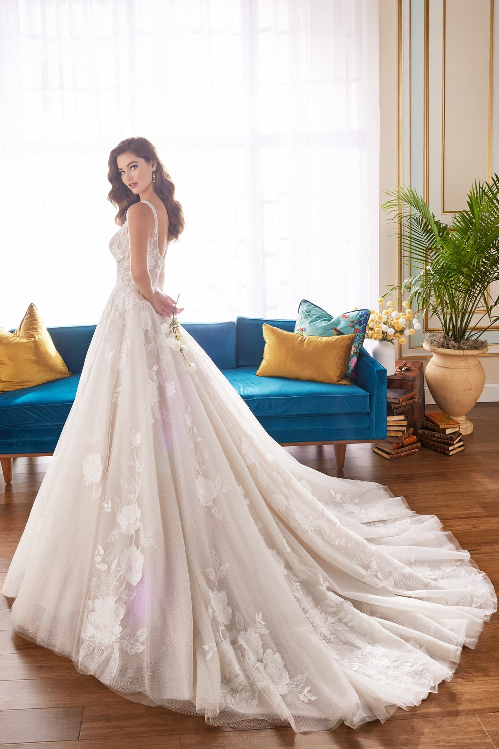 Martin Thornburg MT5105 Blanca wedding dress with square neckline and sparkly tulle with floral appliqués back view