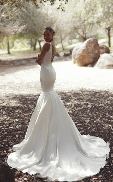 Pnina Tornai fit-and-flare wedding dress with low back v-neckline train and back view