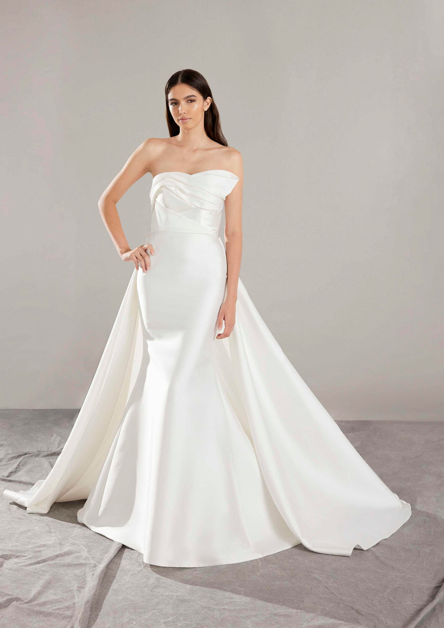 Pronovias Arya strapless mermaid wedding dress with overskirt front view