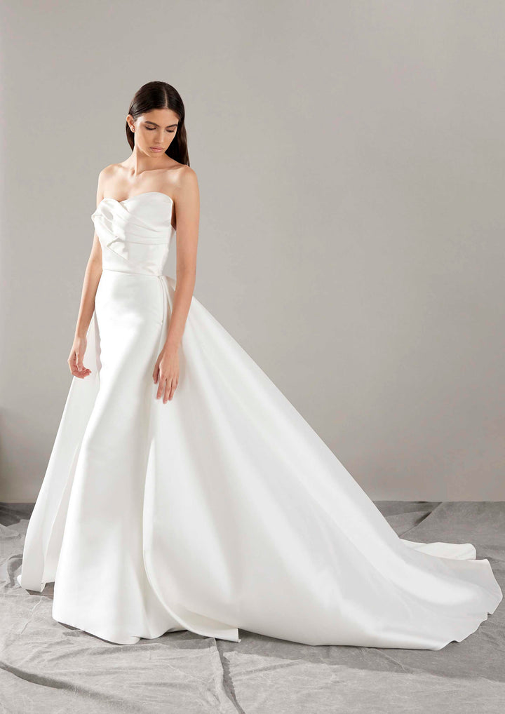 Pronovias Arya strapless mermaid wedding dress with overskirt side view