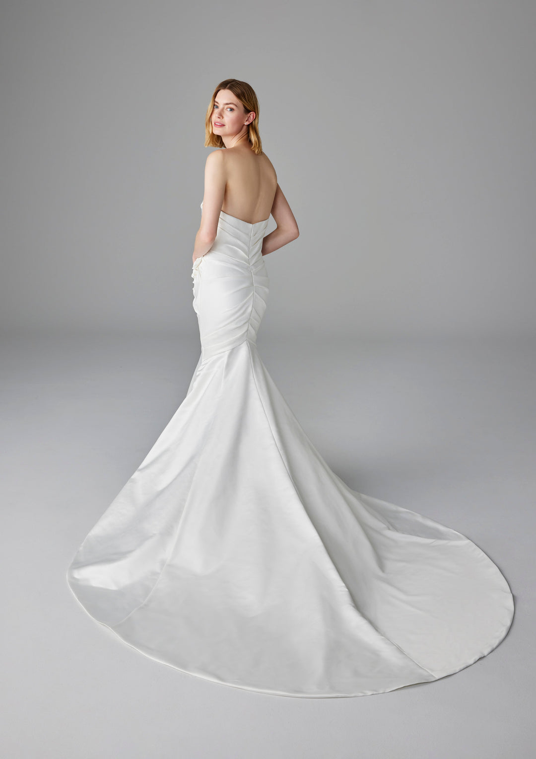 Pronovias Bozena fitted strapless wedding dress with floral detail back view
