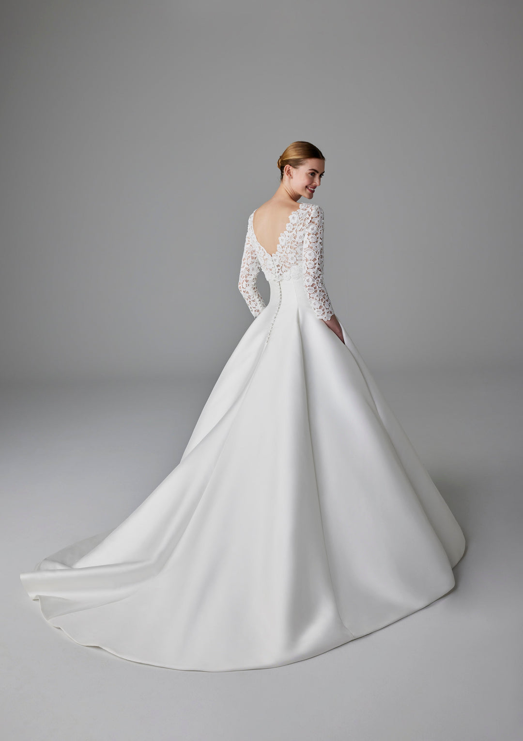 Pronovias Cammi long-sleeves wedding dress with lace top and mikado skirt back view