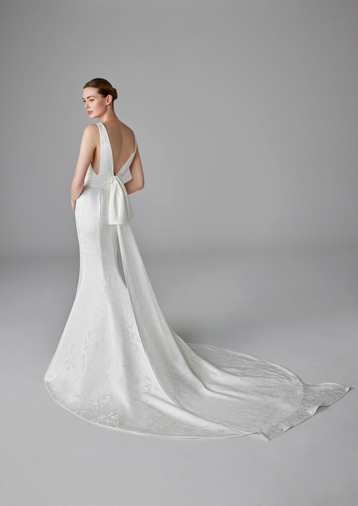 Pronovias Charline fitted wedding dress with v-neckline and low back train view