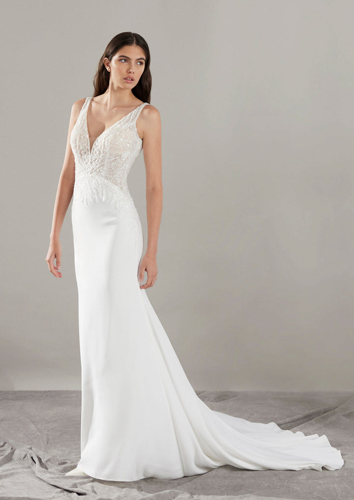 Pronovias Clin fitted wedding dress with beaded neckline and low back side view