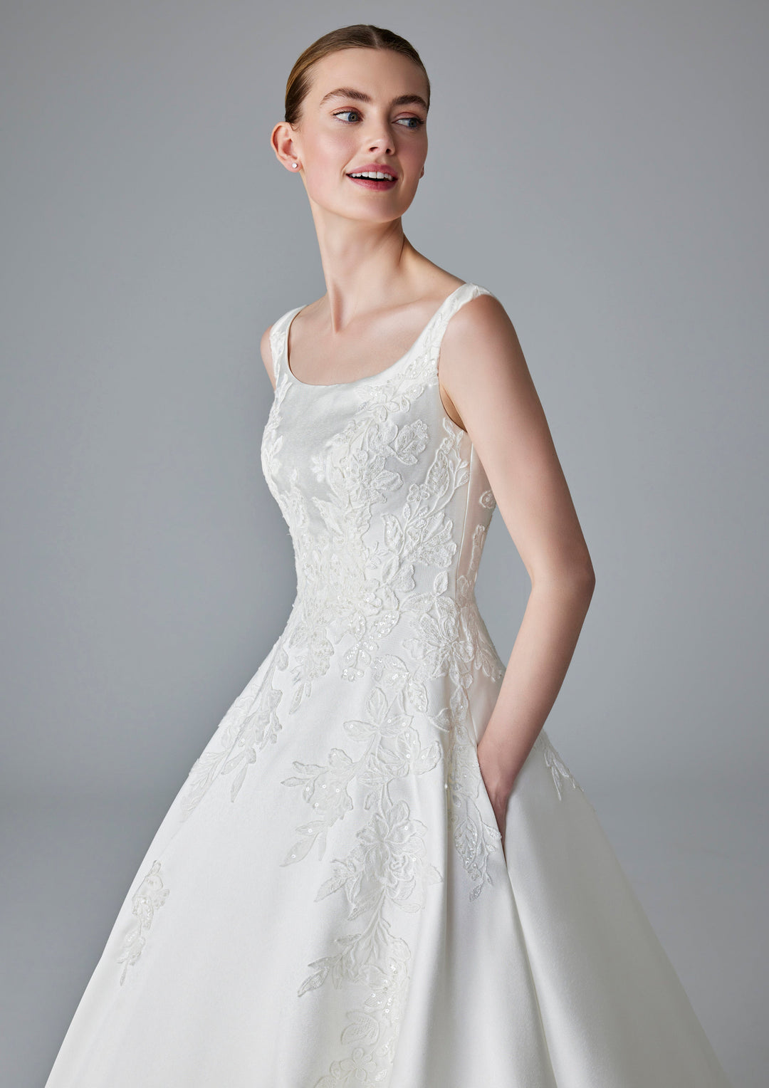 Pronovias Dalida wedding dress with floral appliqué and straps front details view