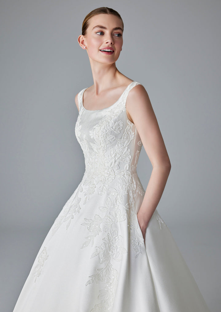 Pronovias Dalida wedding dress with floral appliqué and straps front details view