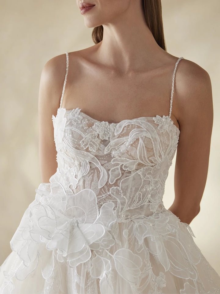 Pronovias Daylily wedding dress with floral design and spaghettini straps front details view