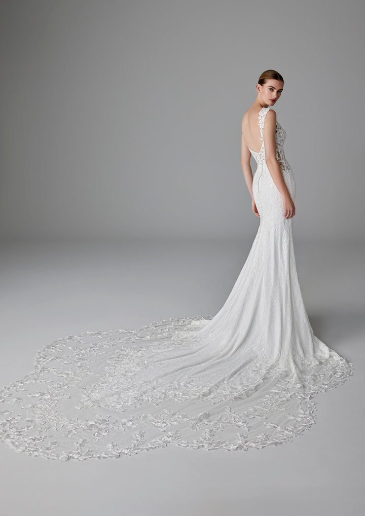 Pronovias Dion fitted wedding dress with floral appliqué back view