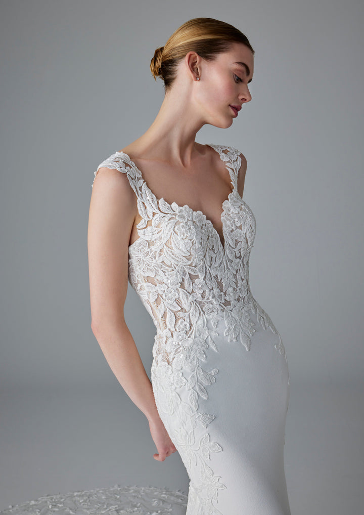 Pronovias Dion fitted wedding dress with floral appliqué front details