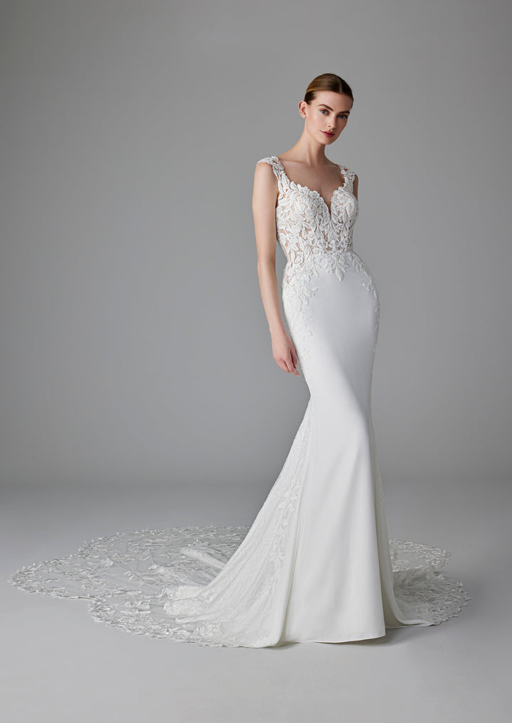 Pronovias Dion fitted wedding dress with floral appliqué front view