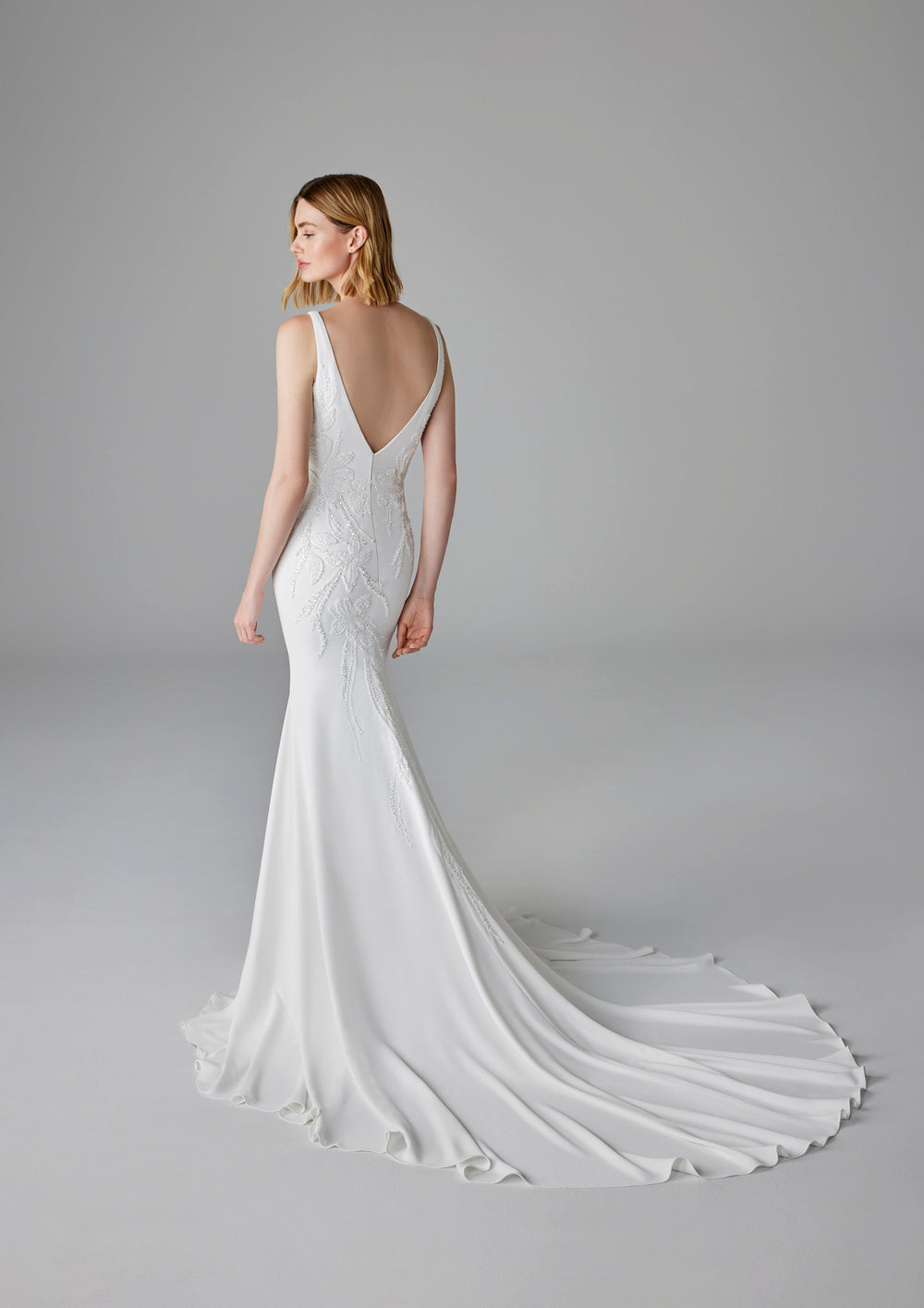 Pronovias Dulcie fitted wedding dress with  floral appliqué back view