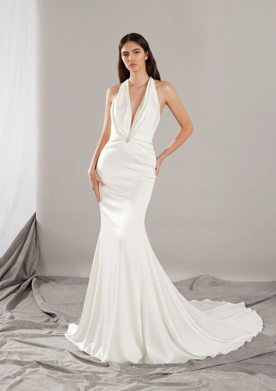 Pronovias Gabriell fitted satin wedding dress with halter neckline and low back front view