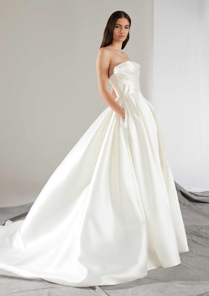 Pronovias Khloe a-line wedding dress strapless with asymmetrical neckline and micro fabric side view