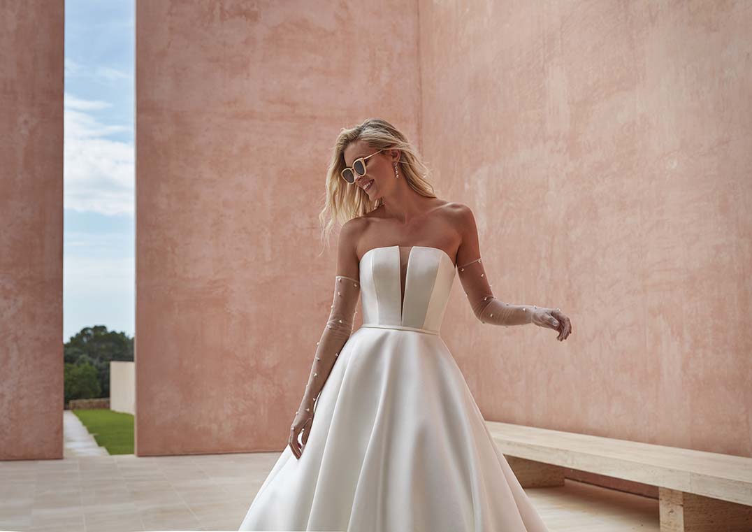 Pronovias Ozen ball gown mikado strapless wedding dress natural waist detail view