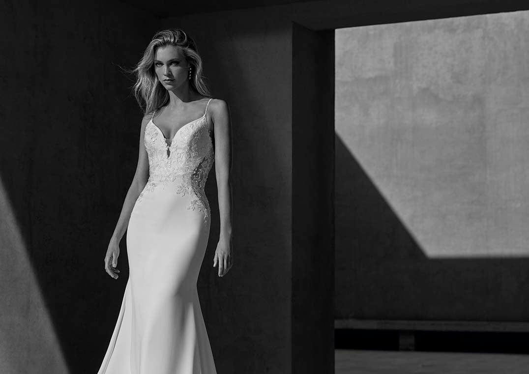 Pronovias Roanna fitted crepe wedding dress low back lace appliqué front view