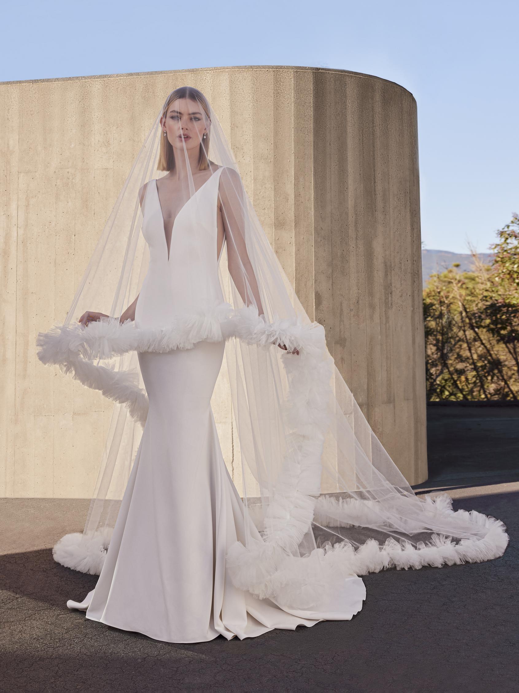 Pronovias Snowbeet mermaid crape wedding dress v-neckline front view
