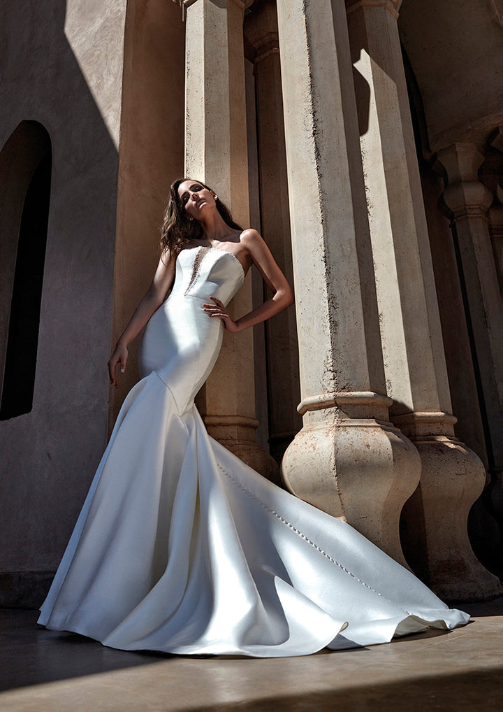 Pronovias Tasman sample sale strapless mermaid wedding dress beaded top mikado front and train view