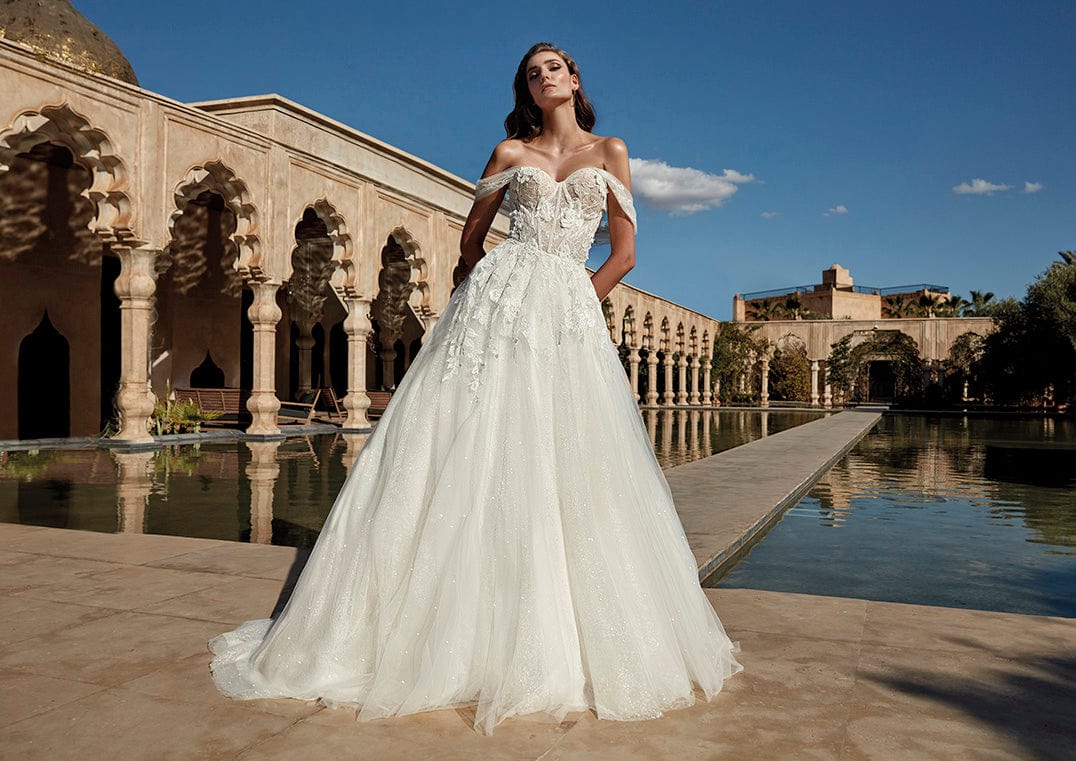 Pronovias Wander Sample Sale a-line wedding dress sparkle off-the-shoulder sweetheart neckline side view