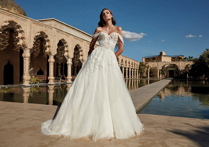 Pronovias Wander Sample Sale a-line wedding dress sparkle off-the-shoulder sweetheart neckline side view