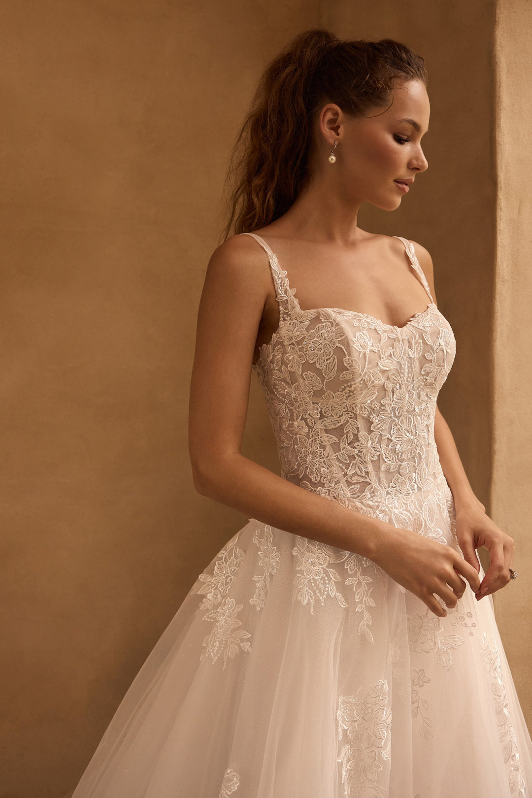 Sophia Tolli Maya Y3173 a-line wedding dress with straps and floral appliqués side view
