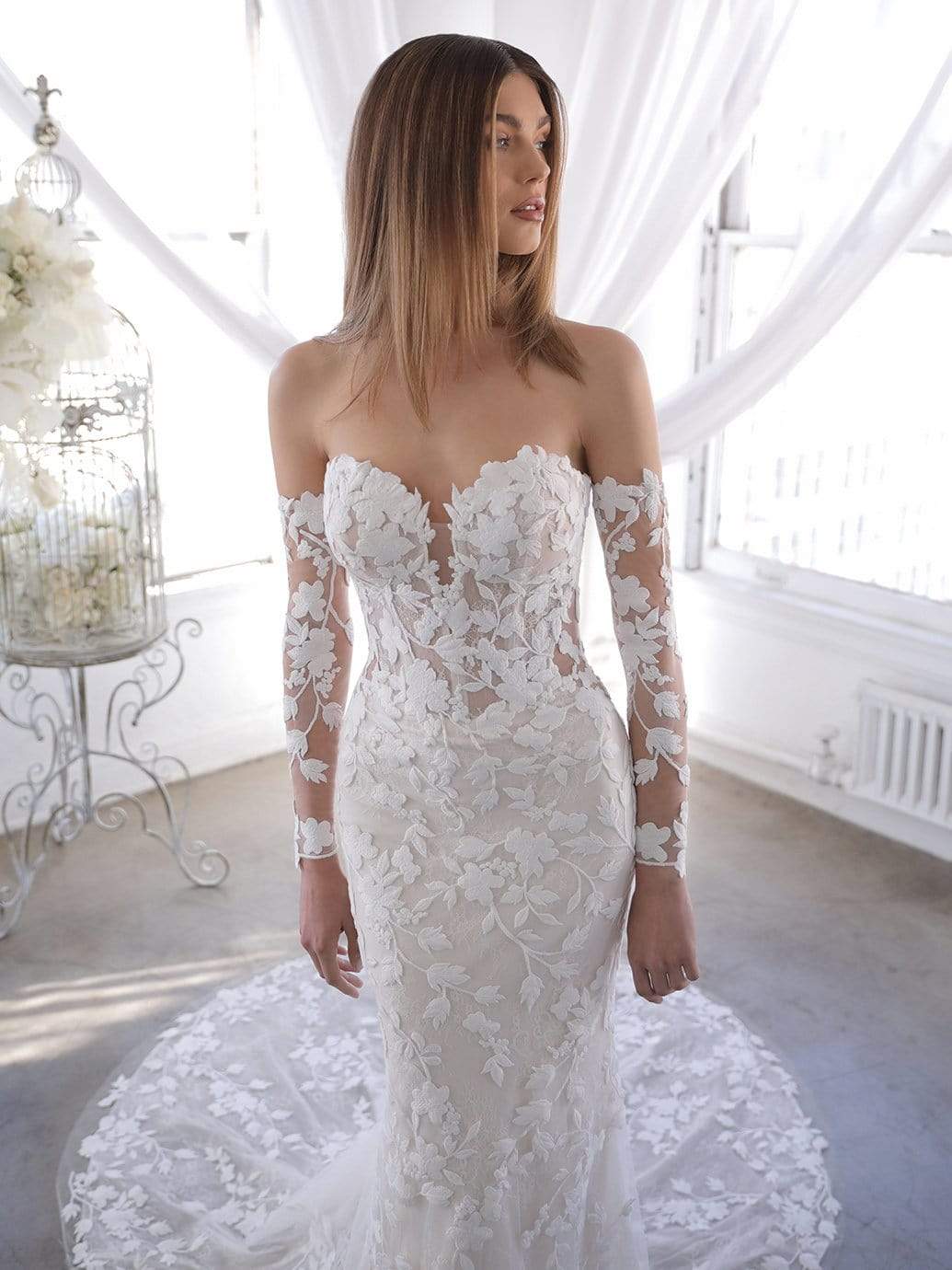 Blue by Enzoani Orrie sample sale wedding dress with floral lace long sleeves front details